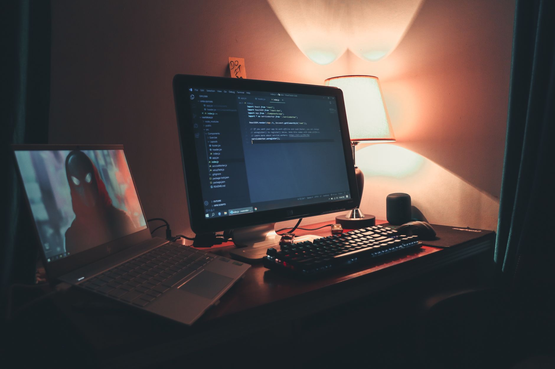 Programmer working through terminal commands at a desk setup